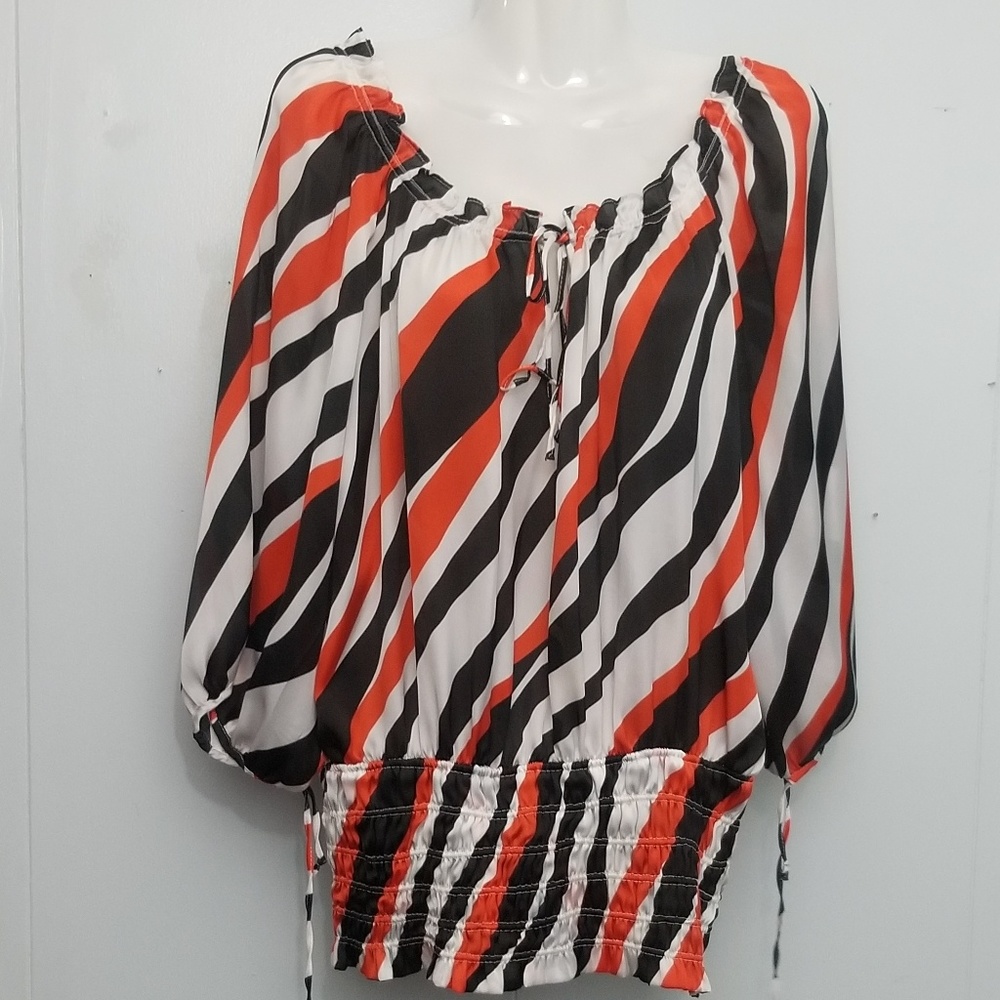 Orange and black striped blouse